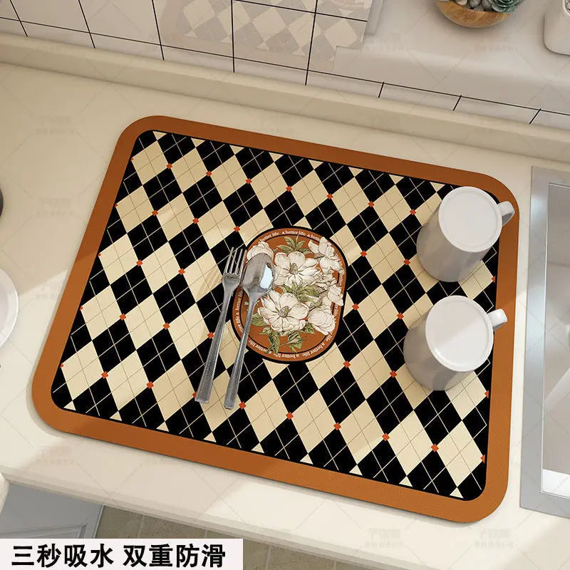 Keep spills in check with a large, ultra-absorbent mat that dries quickly, resists odors, and stays put through busy kitchen routines.