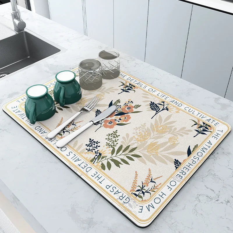 Keep spills in check with a large, ultra-absorbent mat that dries quickly, resists odors, and stays put through busy kitchen routines.