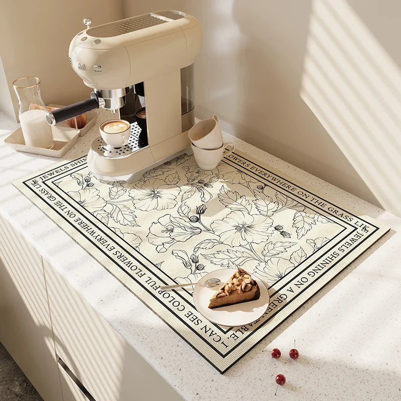 Keep spills in check with a large, ultra-absorbent mat that dries quickly, resists odors, and stays put through busy kitchen routines.