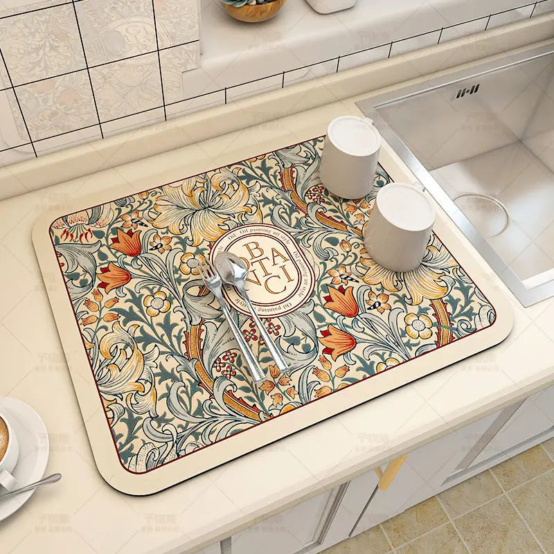 Keep spills in check with a large, ultra-absorbent mat that dries quickly, resists odors, and stays put through busy kitchen routines.