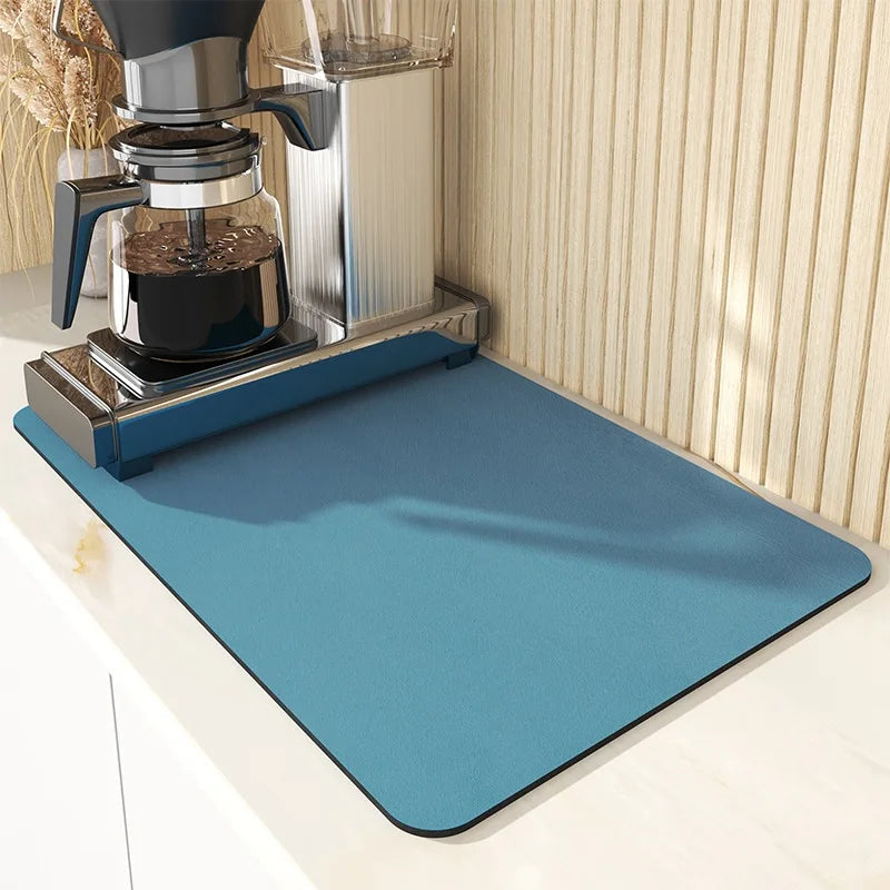 Keep spills in check with a large, ultra-absorbent mat that dries quickly, resists odors, and stays put through busy kitchen routines.