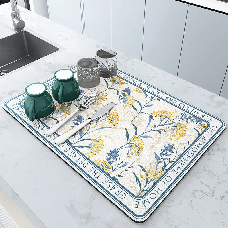 Keep spills in check with a large, ultra-absorbent mat that dries quickly, resists odors, and stays put through busy kitchen routines.