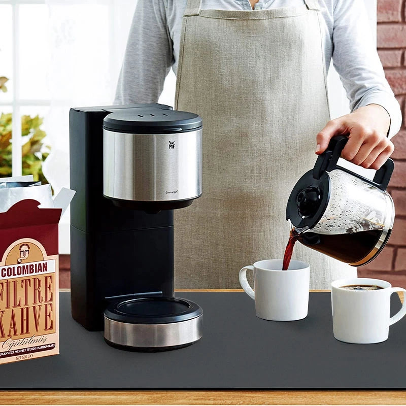 Keep spills in check with a large, ultra-absorbent mat that dries quickly, resists odors, and stays put through busy kitchen routines.