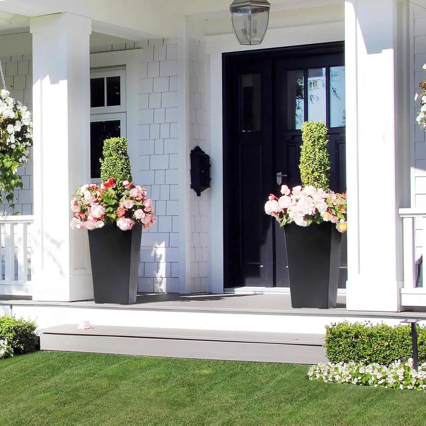 Elevate your space with this pair of 22.4-inch tall taper planters that blend rugged outdoor durability with refined indoor style.