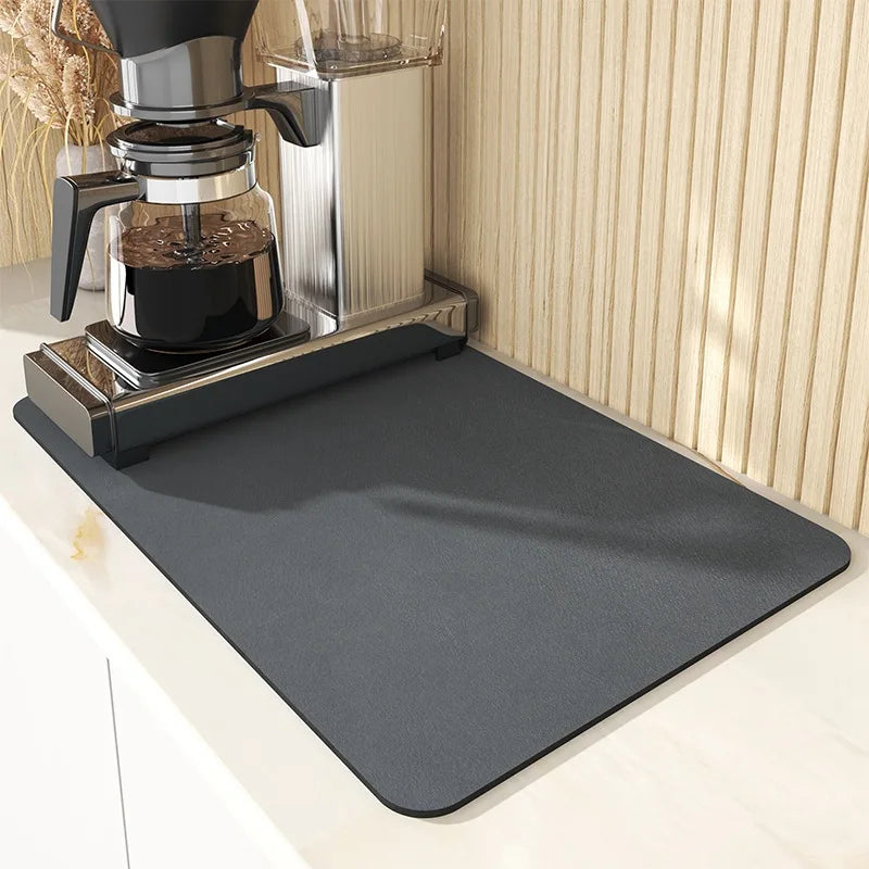 Keep spills in check with a large, ultra-absorbent mat that dries quickly, resists odors, and stays put through busy kitchen routines.